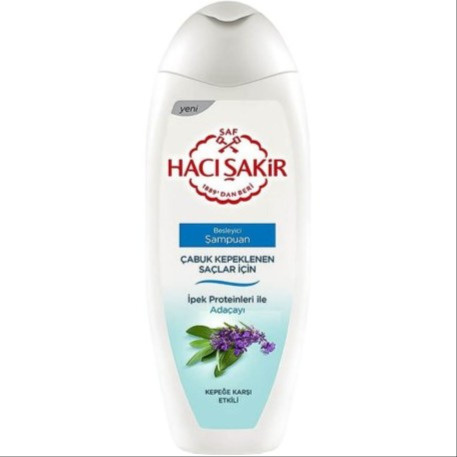 image_QfN564u شامپوی حاجی شاکر محتوی عصاره گل بهاری مناسب تمامی موها و ضد شوره – حجم 500 میل - Image 1