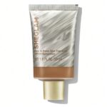 تینت پوست و صورت ضد آفتاب شیگلم SHEGLAM DEW & DONE SPF20 رنگ cashew حجم 30 میل